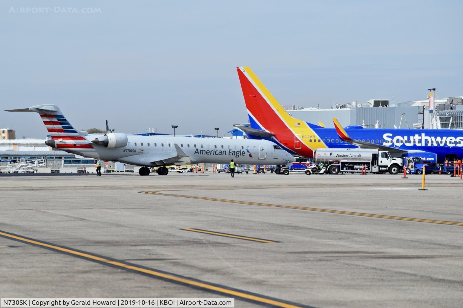 N730SK, 2005 Bombardier CRJ-701 (CL-600-2C10) Regional Jet C/N 10193, Push back from the gate.