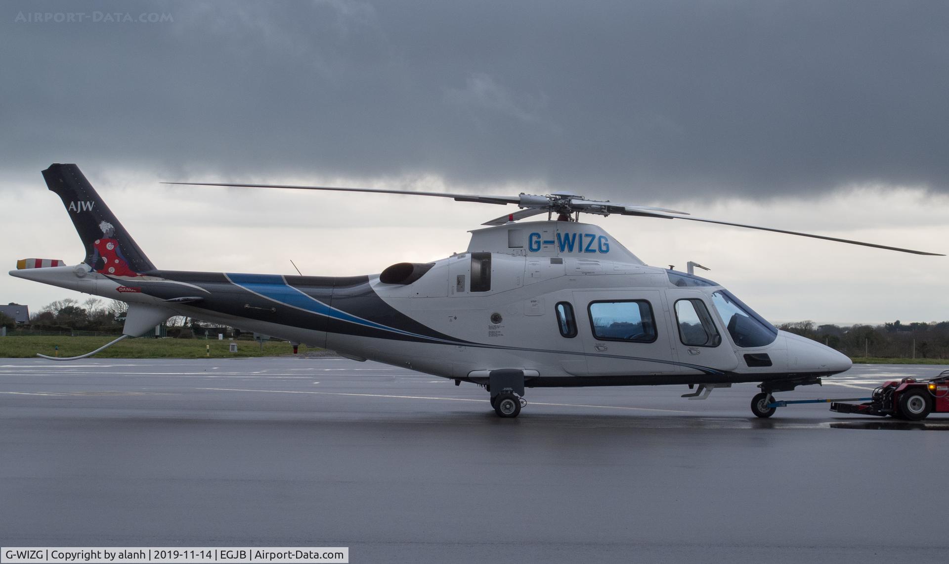G-WIZG, 2001 AgustaWestland AW-109E Power C/N 11123, On the east apron, Guernsey. Nice tail art...