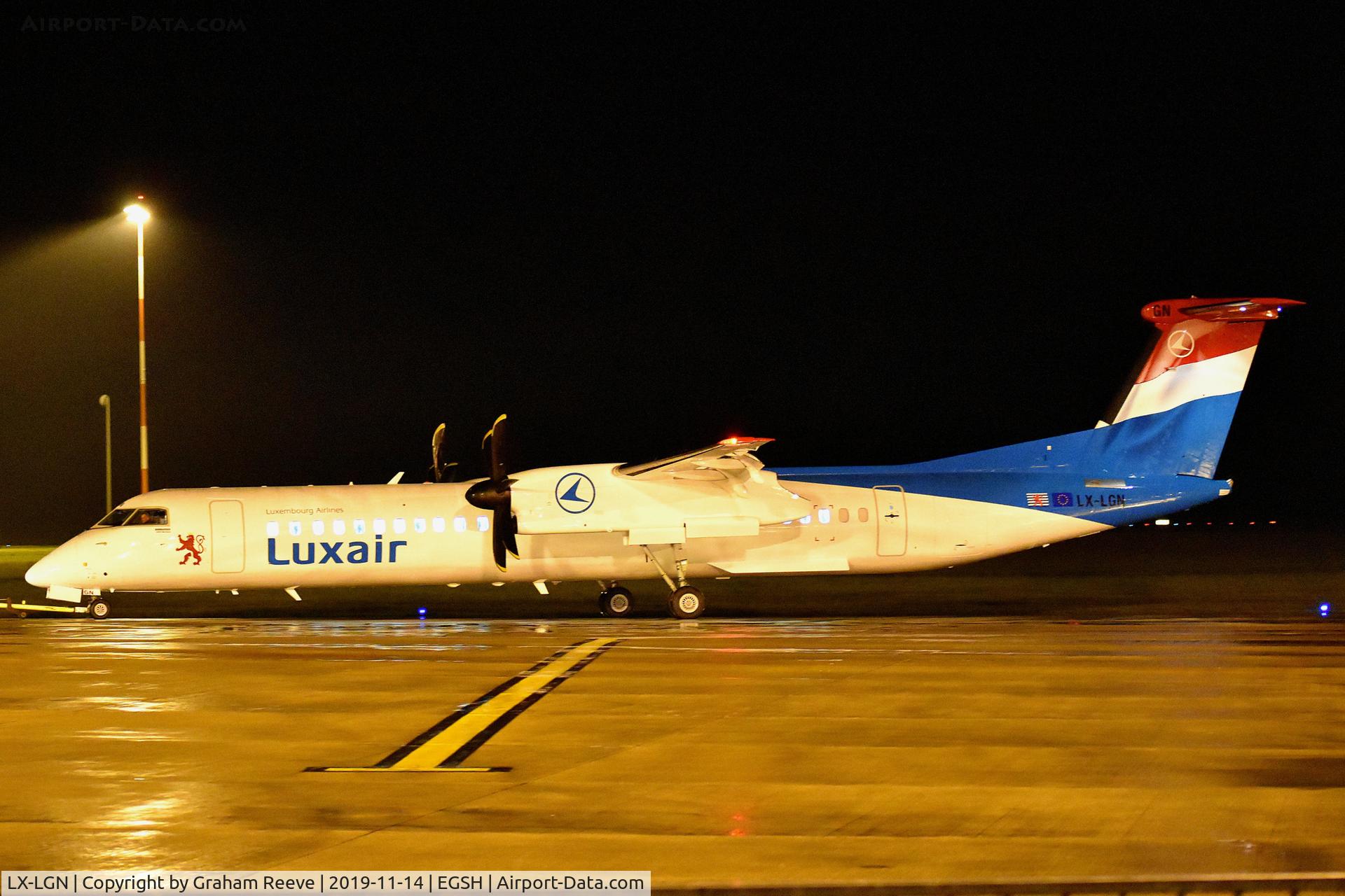 LX-LGN, 2012 De Havilland Canada DHC-8-402Q Dash 8 C/N 4426, Under tow at Norwich.