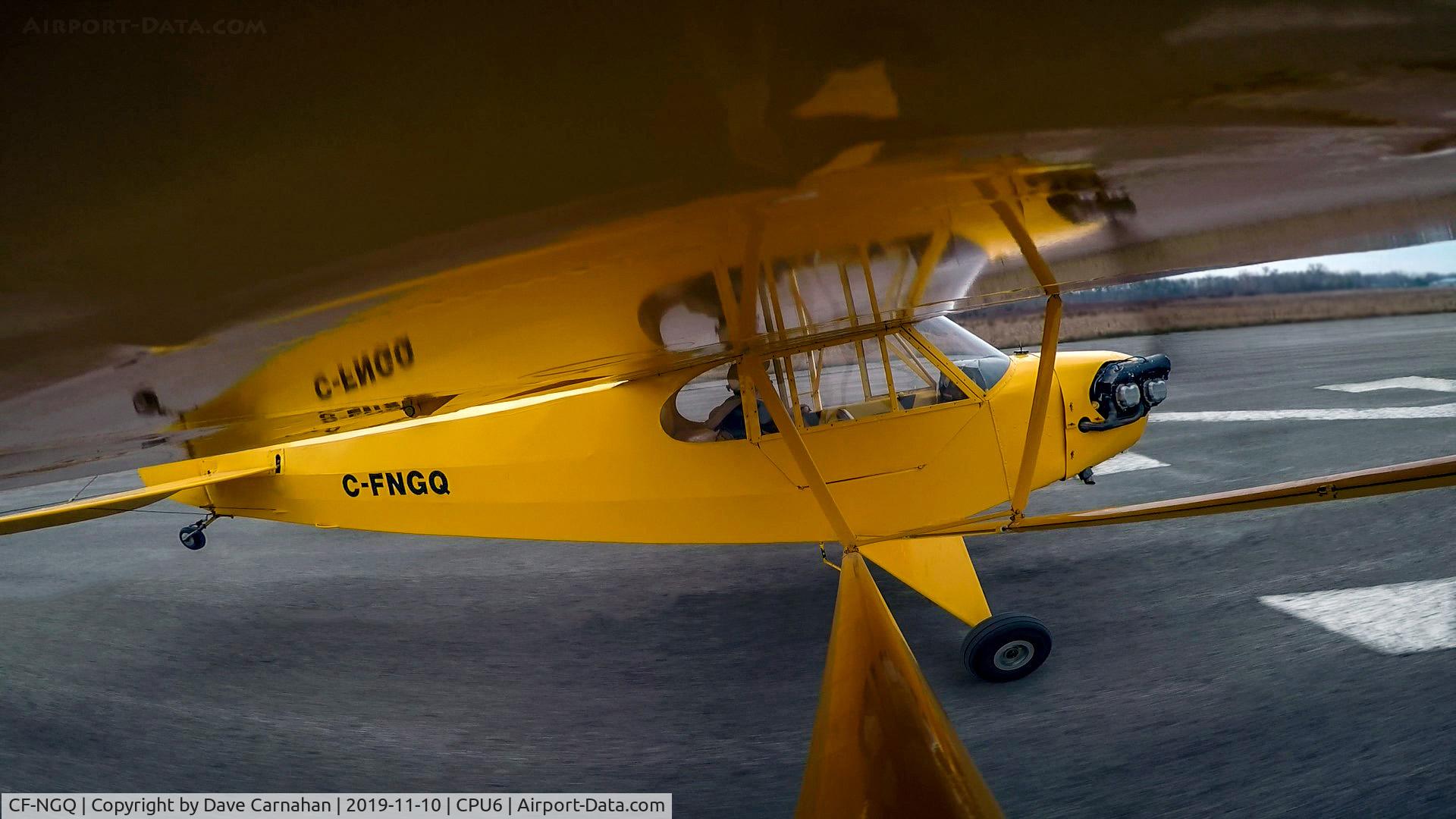 CF-NGQ, 1945 Piper J3C-65 Cub Cub C/N 14816, Photo taken with GoPro canera mounted to right wing strut of CF-NGQ during pre-purchase taxi test on runway 27, Tyendinega-Mohawk airport (CPU6 - Deseronto, Ontario)
