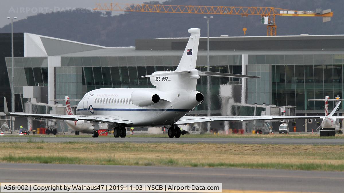 A56-002, 2018 Dassault Falcon 7X C/N 284, Rear Port side view of RAAF 34 Squadron Dassault Falcon 7X Serial A56-002 Cn 284, shown taxying past the Canberra International Airport (YSCB) on 03Nov2019. Three new Falcon 7X Bizjets have replaced the three Challenger 601s previously operated by 34Sqn.