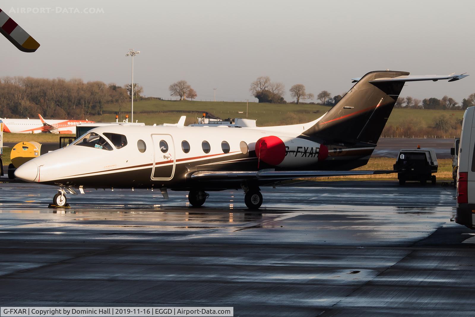 G-FXAR, 1999 Raytheon Beechjet 400A/Nextant N400XT C/N RK-252, Parked on the southside apron