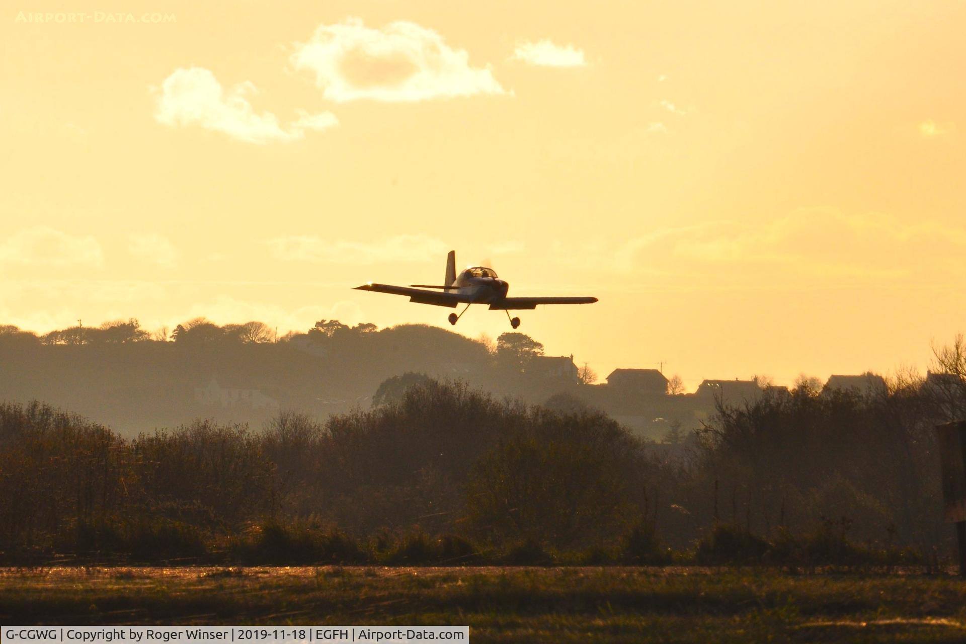 G-CGWG, 2011 Vans RV-7 C/N PFA 323-14486, Resident RV-7 aircraft landing Runway 04 at dusk.