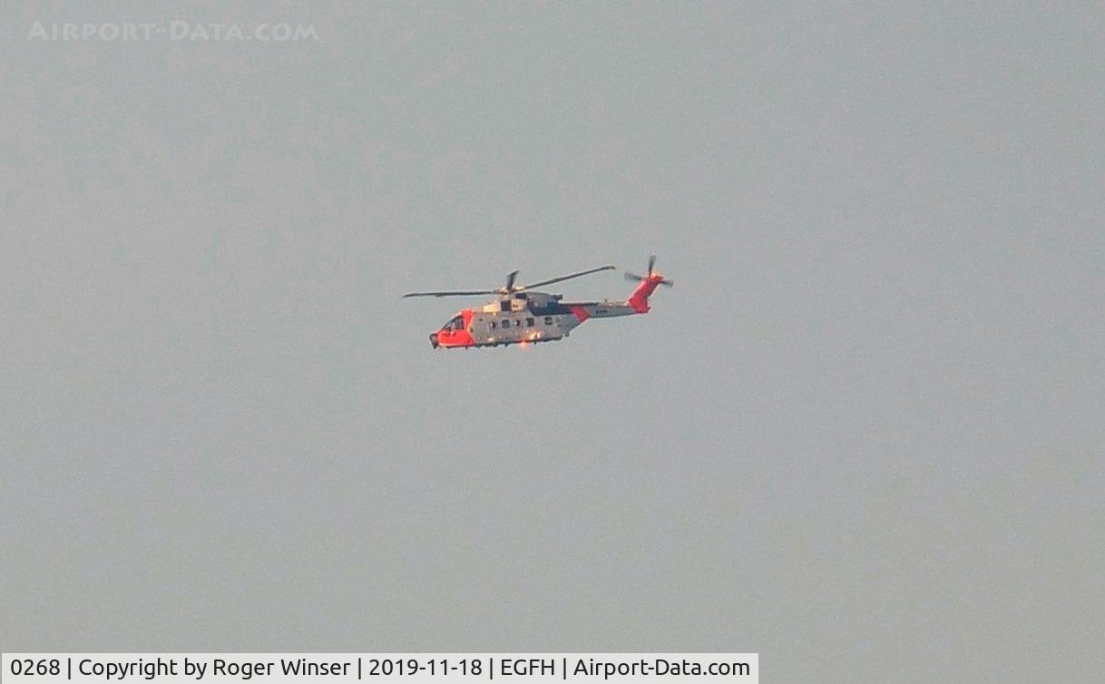 0268, 2017 AgustaWestland AW101 Merlin Mk.612 C/N 50268, Distant view of the Royal Norwegian Air Force search and rescue helicopter seen on trials to the North of the airport. Registered ZZ103 before delivery to the air force in Norway.