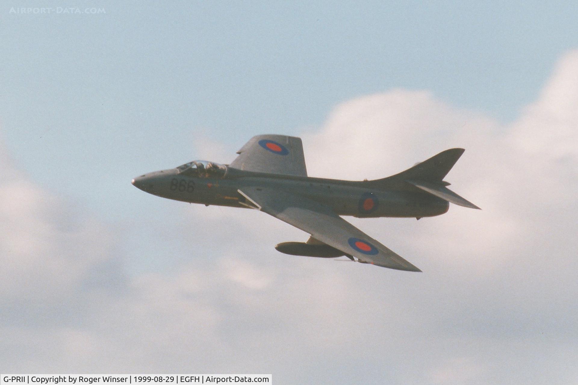 G-PRII, 1955 Hawker Hunter PR.11 C/N 41H-670690, EX-Royal Navy Hunter aircraft coded 866/VL over Swansea Airport.