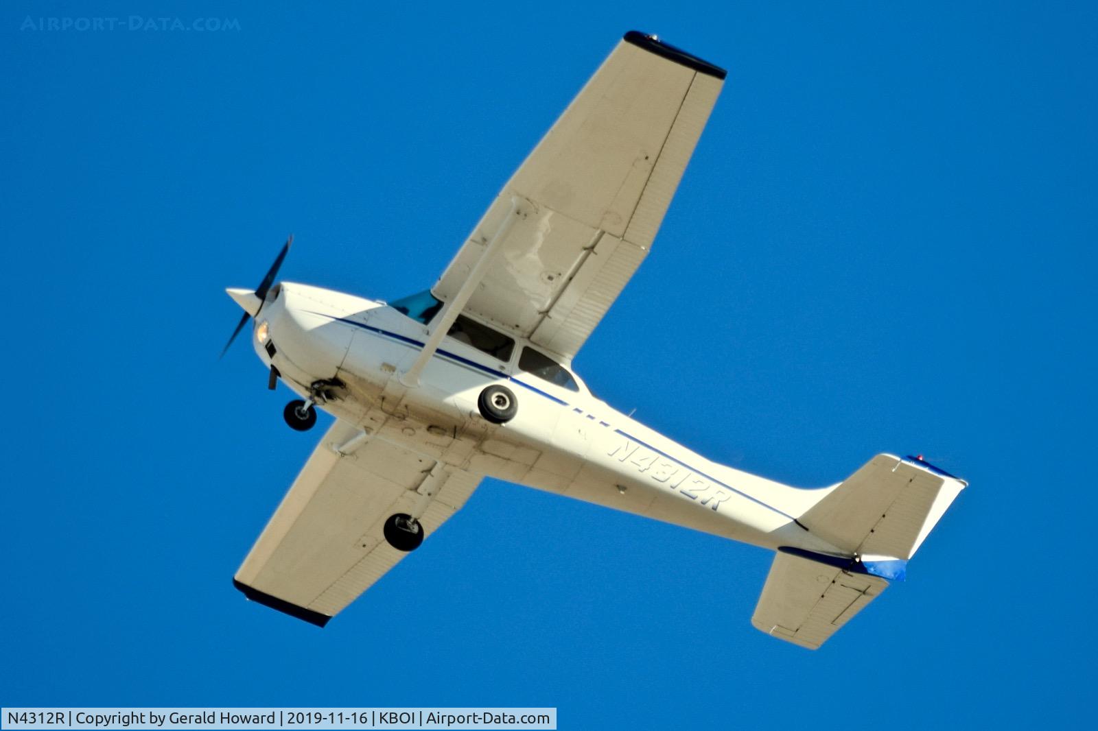 N4312R, 1974 Cessna 172M C/N 17263065, Climb out from 28L.