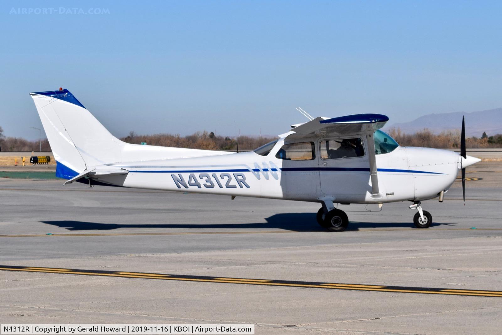 N4312R, 1974 Cessna 172M C/N 17263065, Taxiing on Bravo.