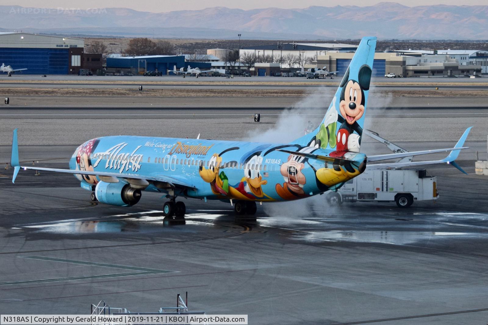 N318AS, 2003 Boeing 737-990 C/N 30018, De iced at the gate.