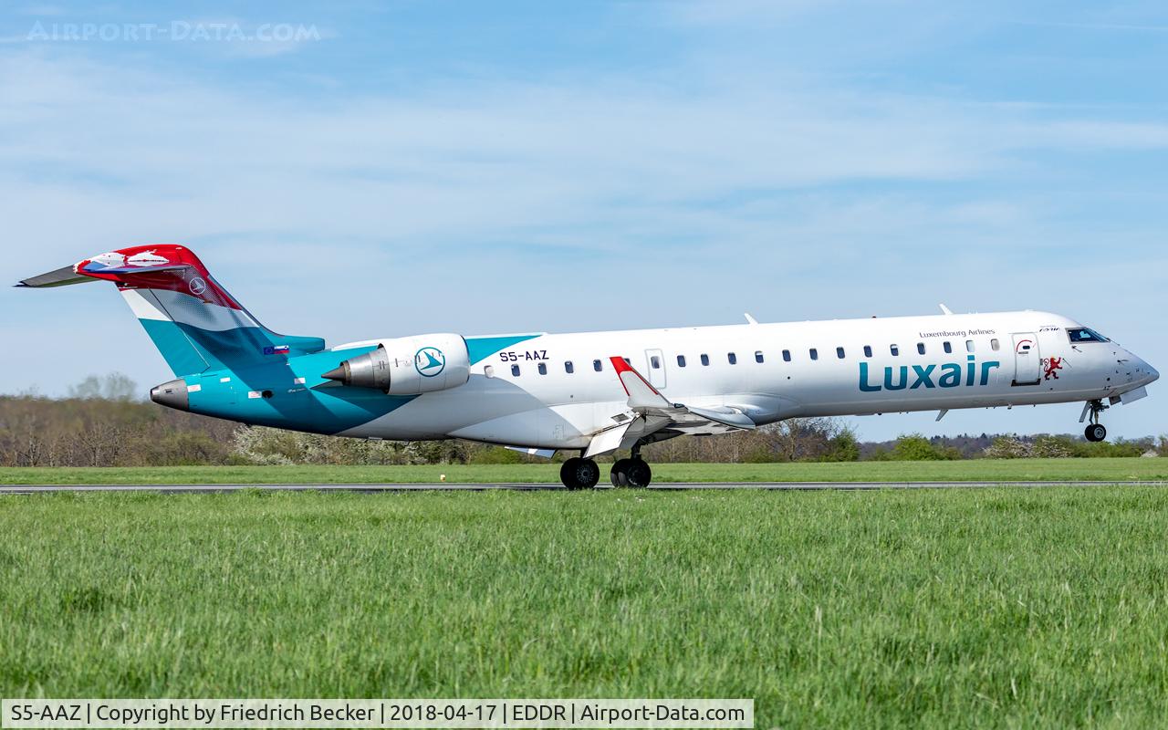 S5-AAZ, 2001 Canadair CRJ-700 (CL-600-2C10) Regional Jet C/N 10014, touching down on RW09