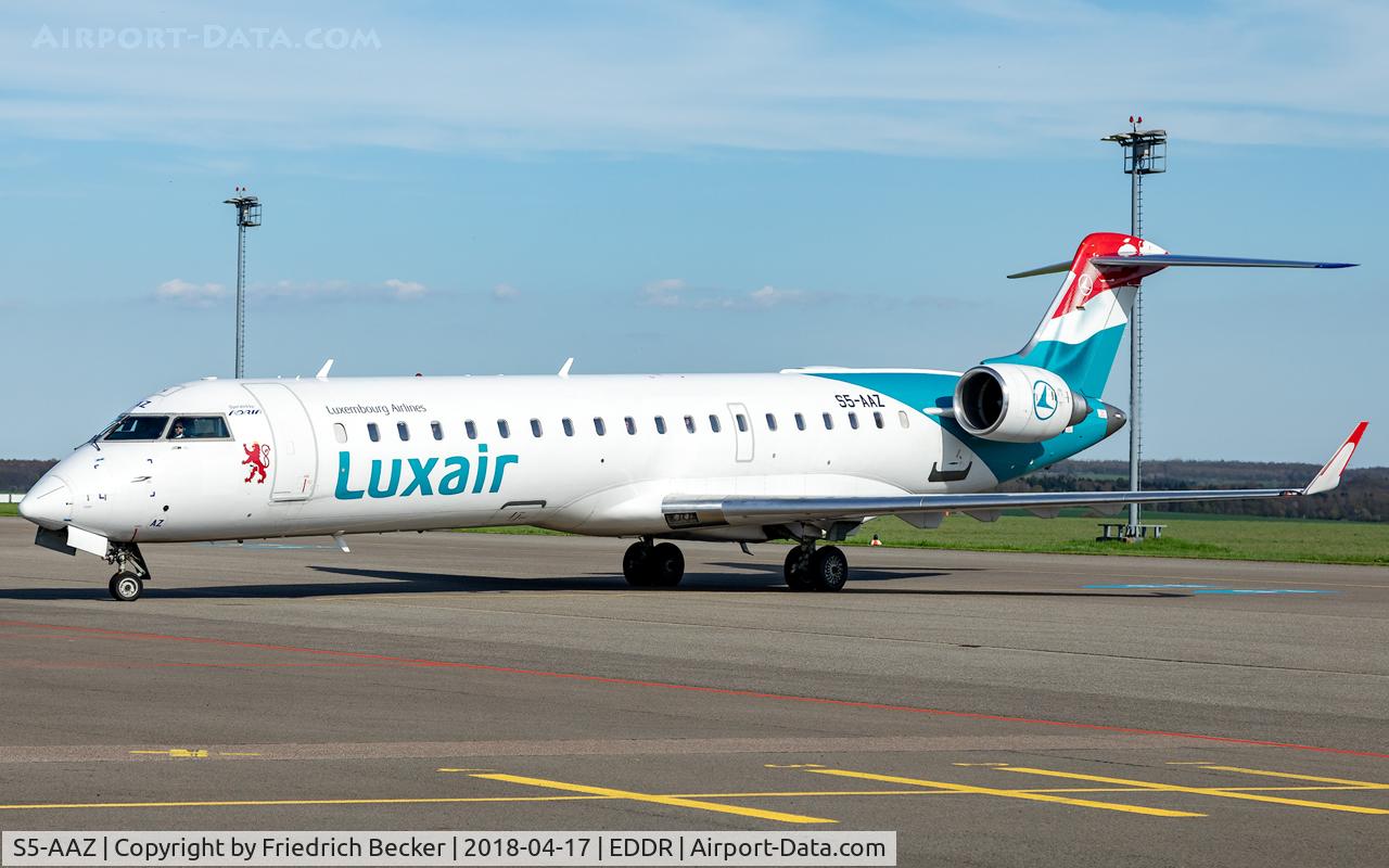 S5-AAZ, 2001 Canadair CRJ-700 (CL-600-2C10) Regional Jet C/N 10014, returning from TXL