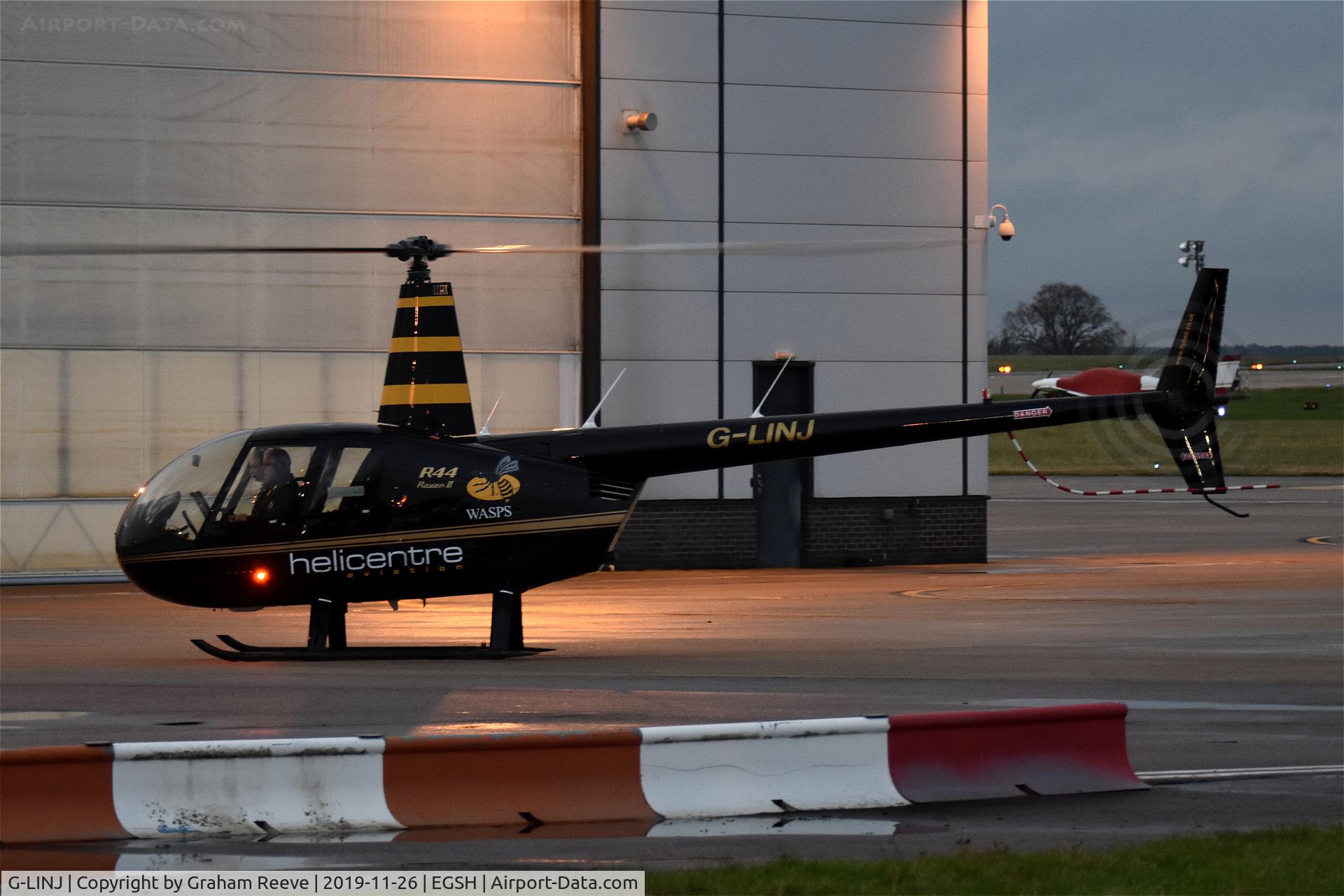 G-LINJ, 2008 Robinson R44 Raven II C/N 12168, About to depart from Norwich.