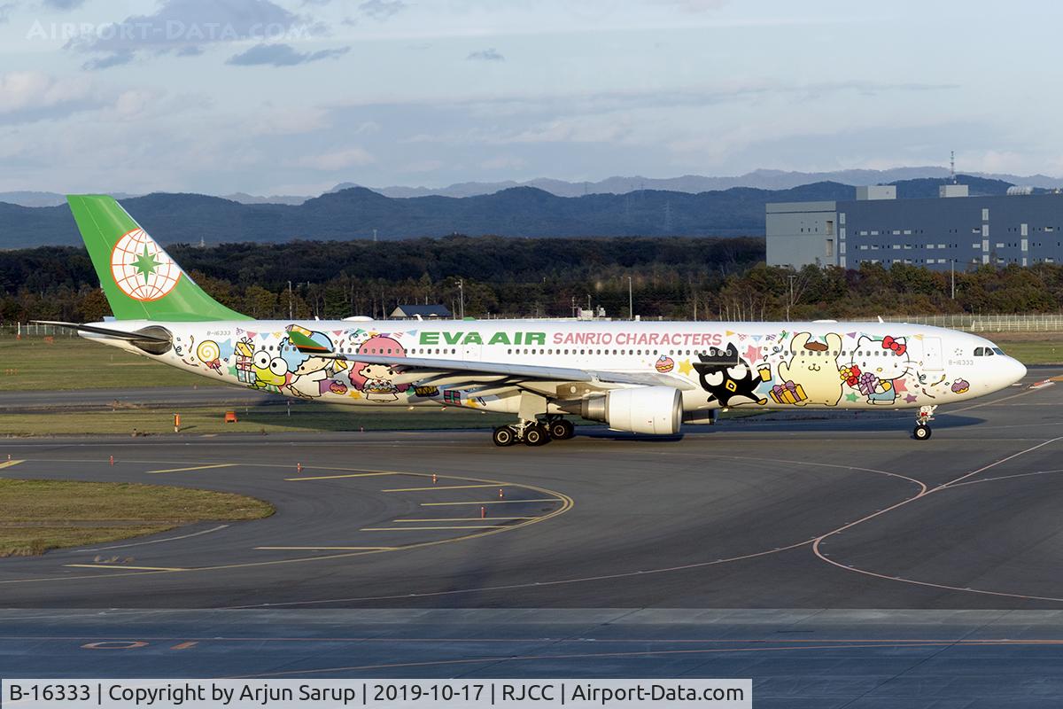 B-16333, 2011 Airbus A330-302 C/N 1274, The autumn evening light falls on BR115 as it rolls out for departure from Sapporo to Taipei.