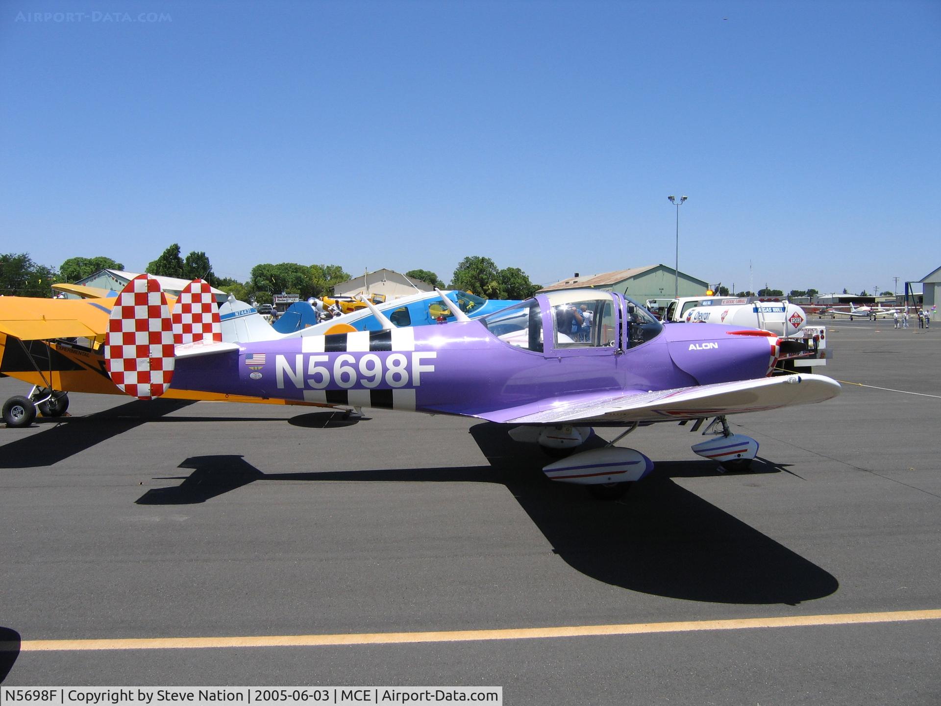 N5698F, 1966 Alon A2 Aircoupe C/N A-198, 1966 Alon A2 in purple colors with r/wh > tail & bk/w D-Day stripes at Merced, CA