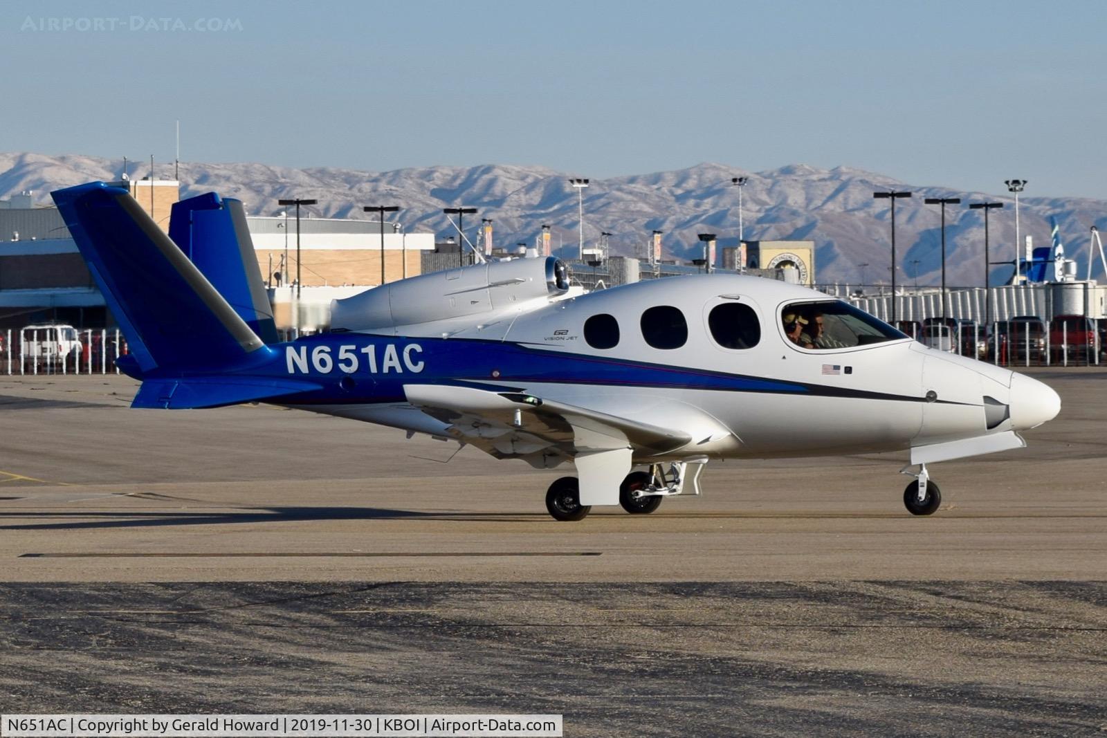 N651AC, 2019 Cirrus SF50 Vision C/N 0153, Taxiing off the north GA ramp.
