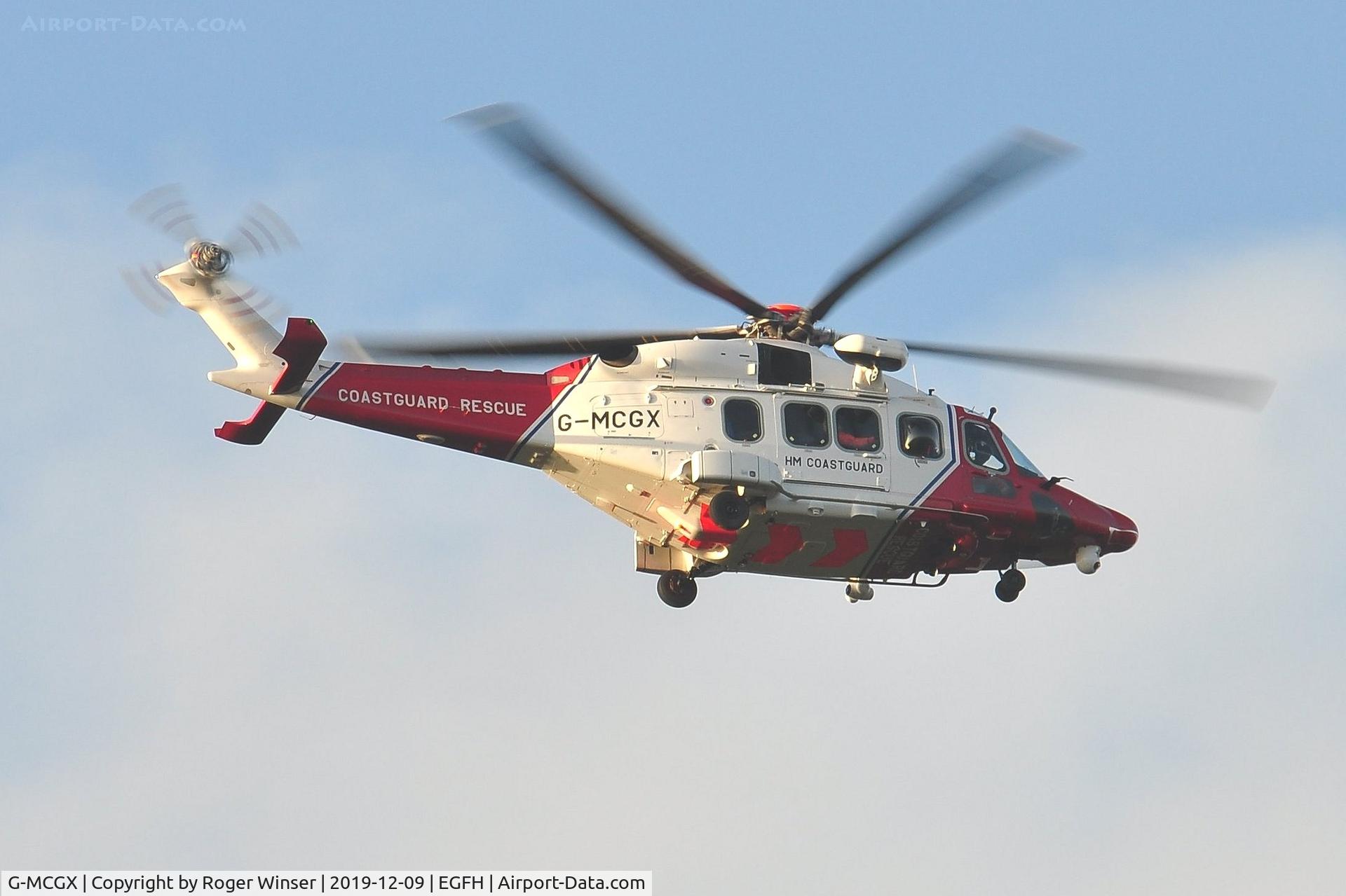 G-MCGX, 2018 Leonardo AW189 C/N 92010, HMCG SAR helicopter (as CG187) seen routing close to the airport.