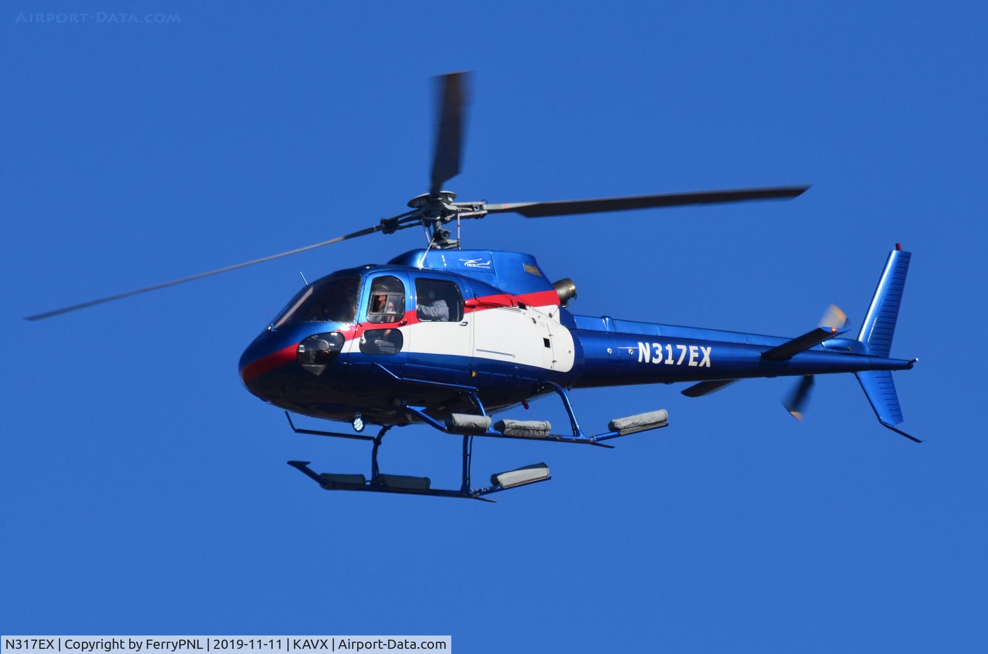 N317EX, 1994 Eurocopter AS-350B-2 Ecureuil C/N 2818, Island Express AS350 overflying AVX