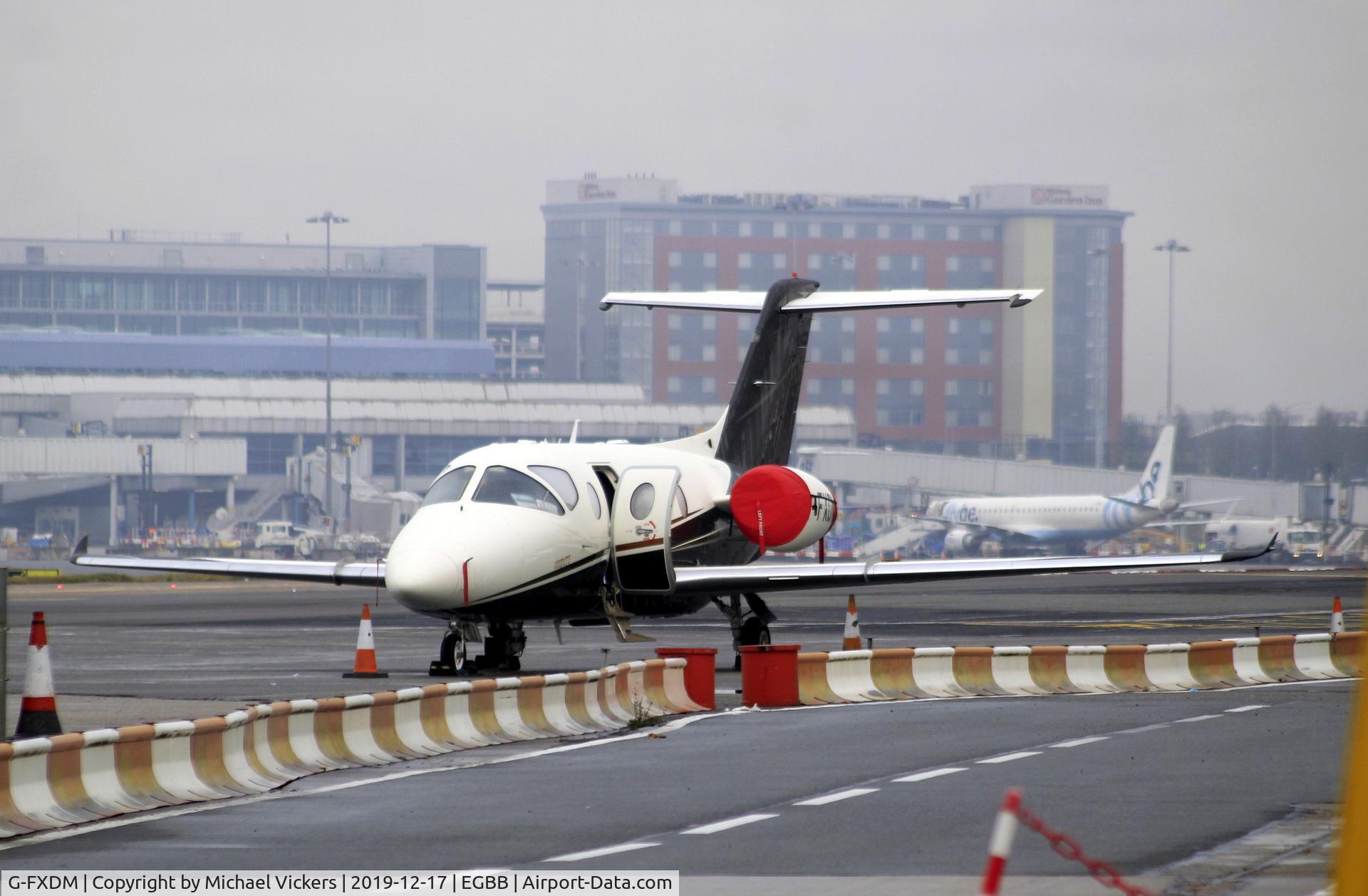 G-FXDM, 2004 Raytheon Beechjet 400A C/N RK-377, Parked at BHX