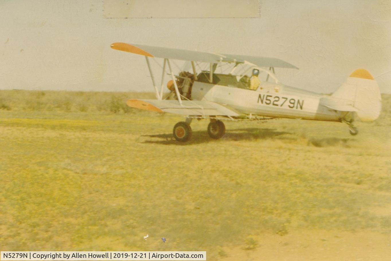 N5279N, 1942 Boeing E75 C/N 75-5926, Working pasture North of Matador Tx.  1972   Allen Howell