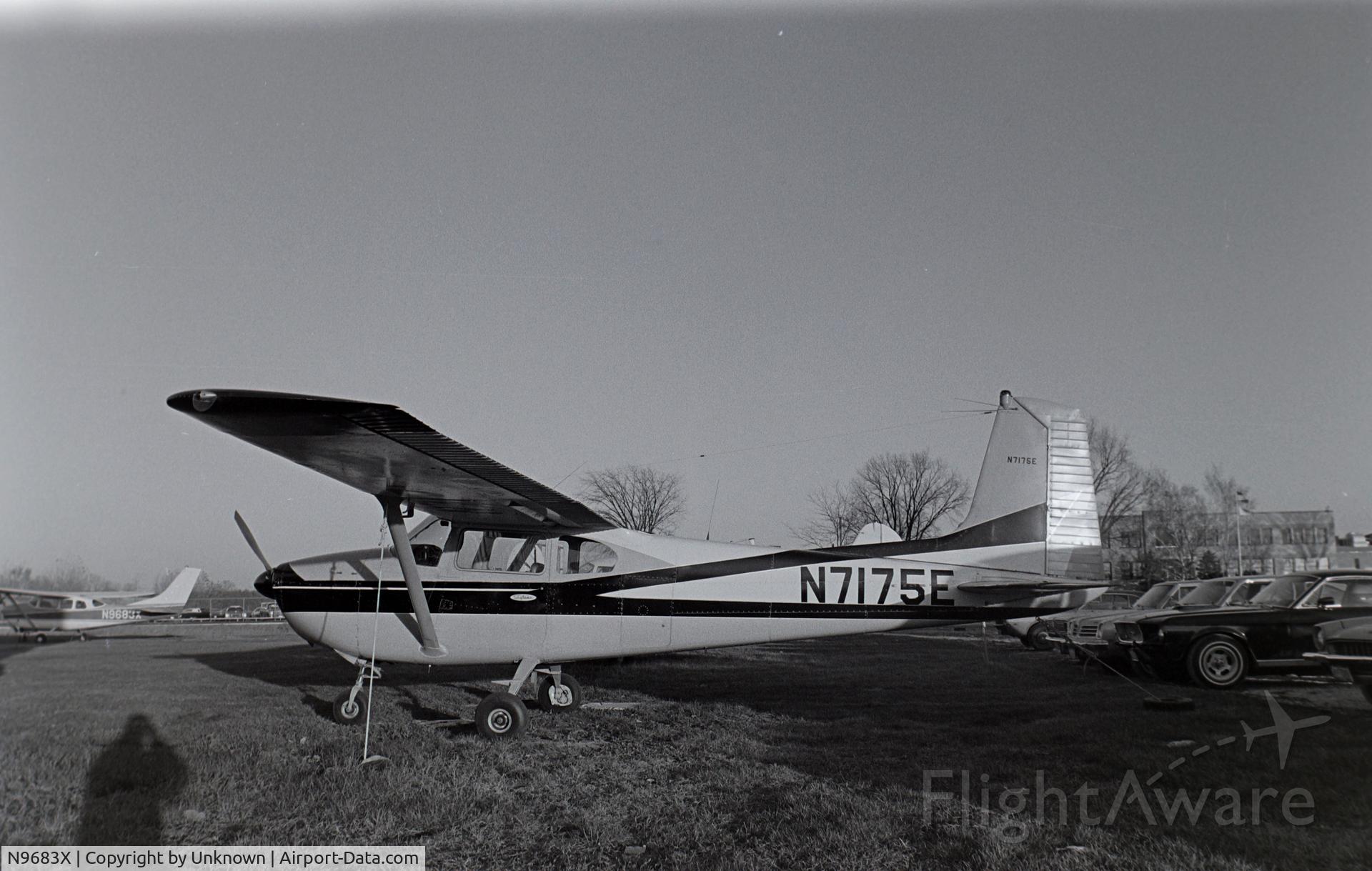 N9683X, 1962 Cessna 210B C/N 21057983, Unknown date/Unknown airport - plane in the background