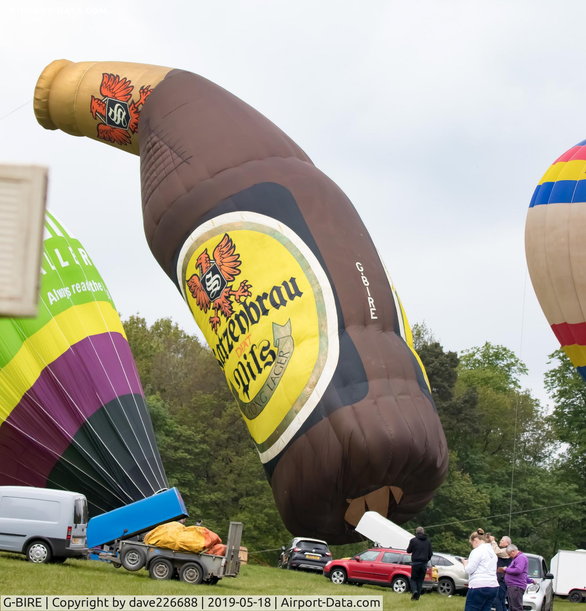 G-BIRE, 1981 Colt Balloons COLT 56 SATZENBRAU BOTTLE C/N 323, G BIRE during inflation at the Midlands Air Festival 2019