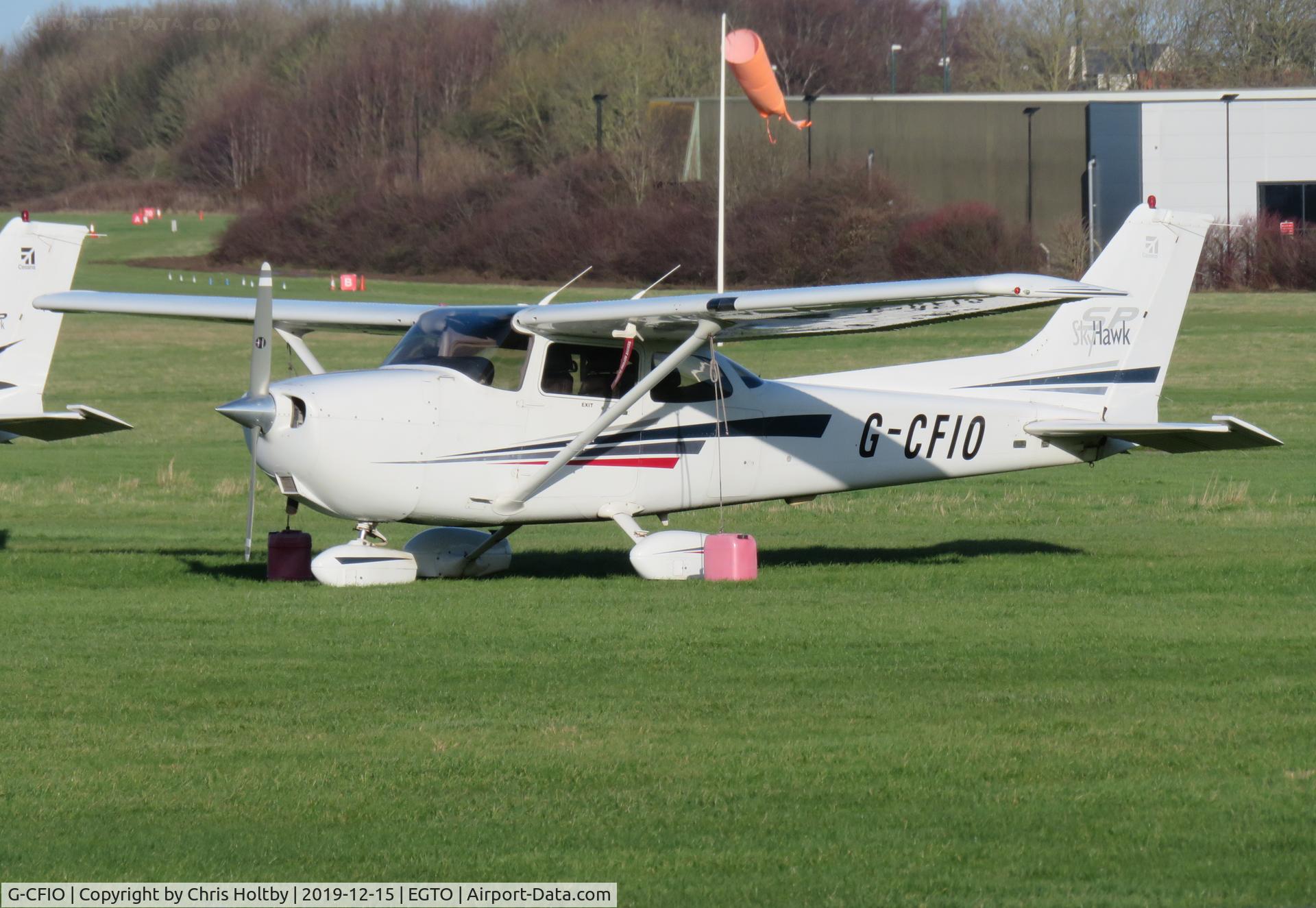 G-CFIO, 2002 Cessna 172S Skyhawk SP C/N 172S9079, Parked at Rochester Airport