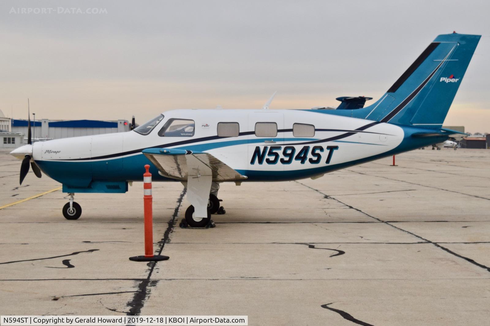 N594ST, 2013 Piper PA-46-350P Malibu Mirage C/N 4636594, Parked on the south GA ramp.