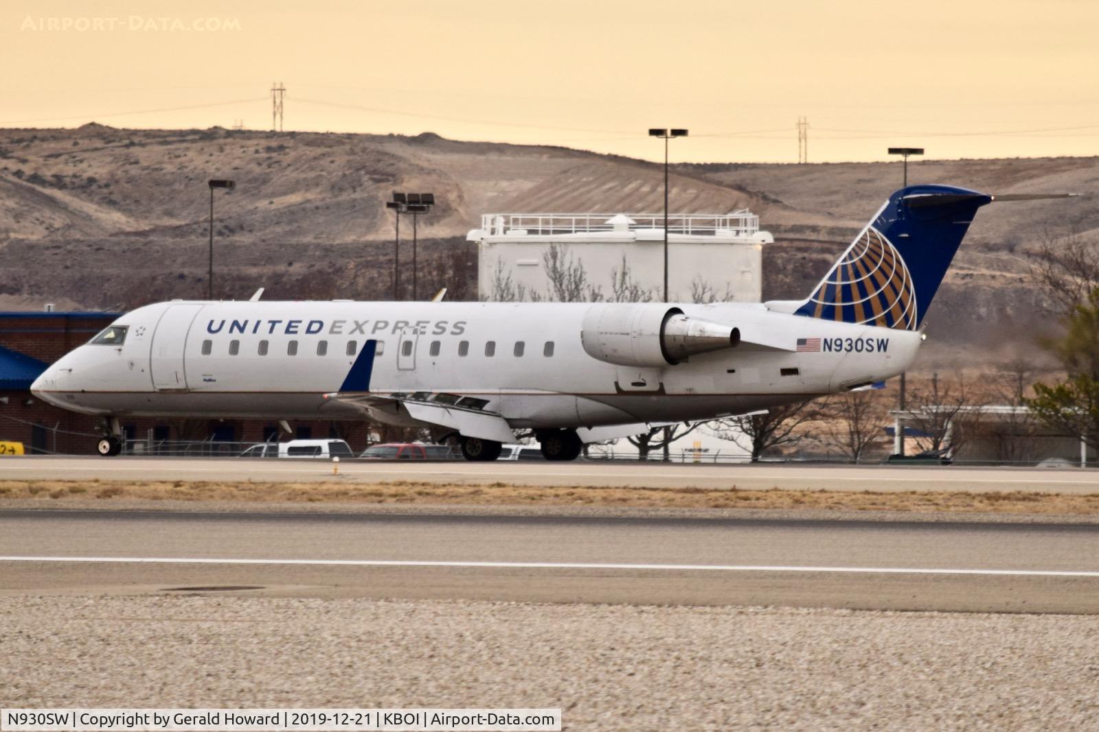 N930SW, 2002 Bombardier CRJ-200LR (CL-600-2B19) C/N 7713, Landing roll out on 10R.