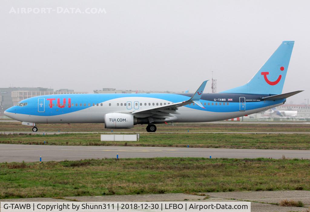 G-TAWB, 2012 Boeing 737-8K5 C/N 37242, Taxiing holding point rwy 32R for departure... TUI titles...