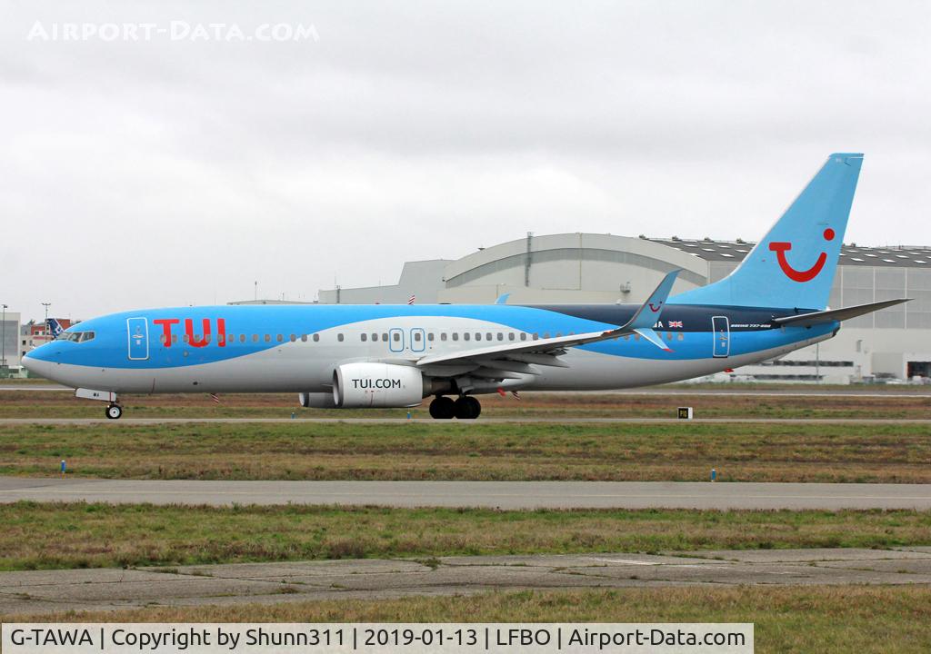 G-TAWA, 2012 Boeing 737-8K5 C/N 37264, Taxiing holding point rwy 32R for departure... TUI titles..