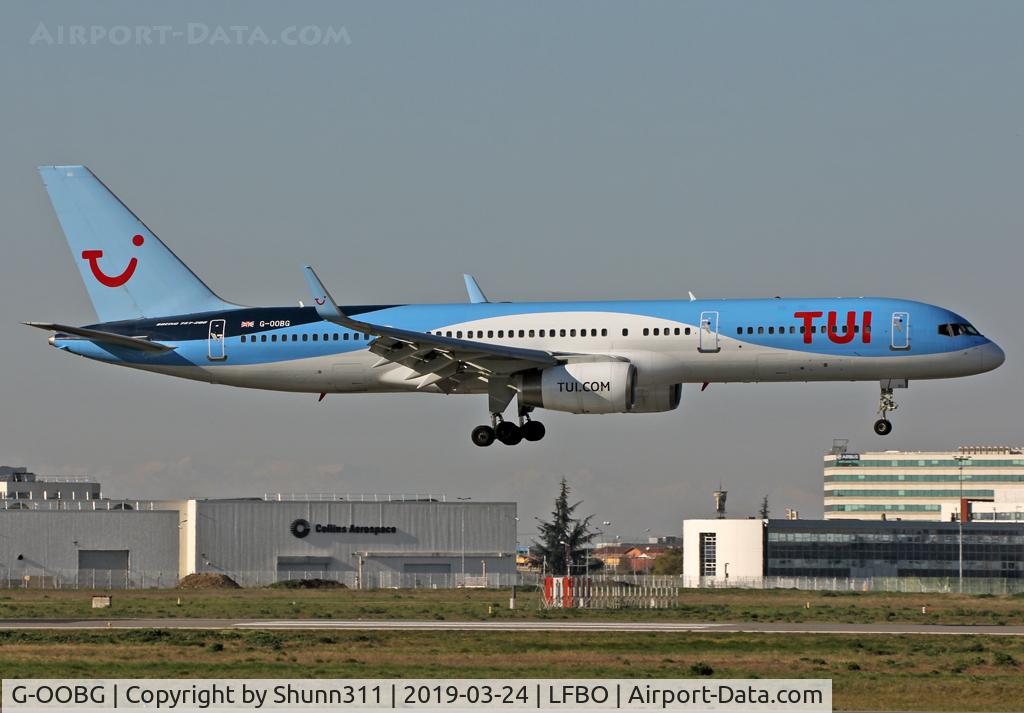 G-OOBG, 1999 Boeing 757-236 C/N 29942, Landing rwy 32R with TUI titles...