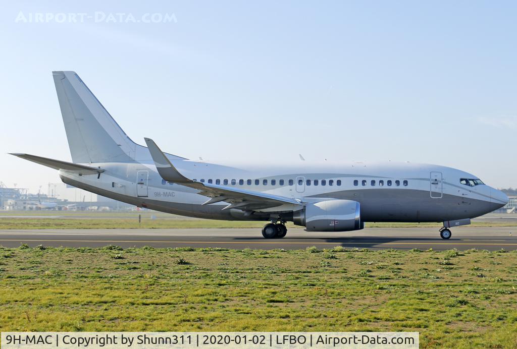 9H-MAC, 1990 Boeing 737-548 C/N 24968, Taxiing holding point rwy 14L for departure...