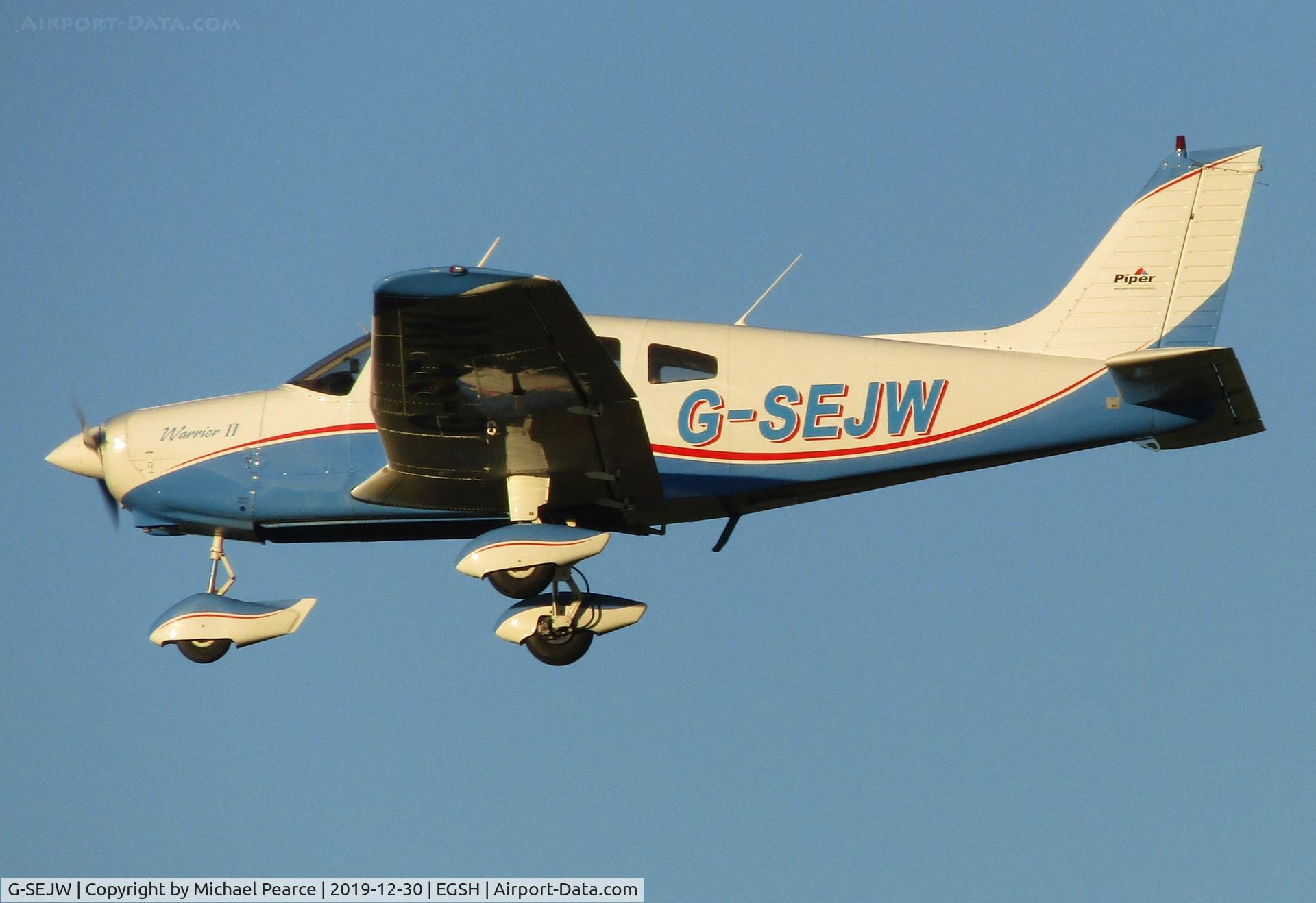 G-SEJW, 1978 Piper PA-28-161 Cherokee Warrior II C/N 28-7816469, On final for RWY 27 during missed approach training.