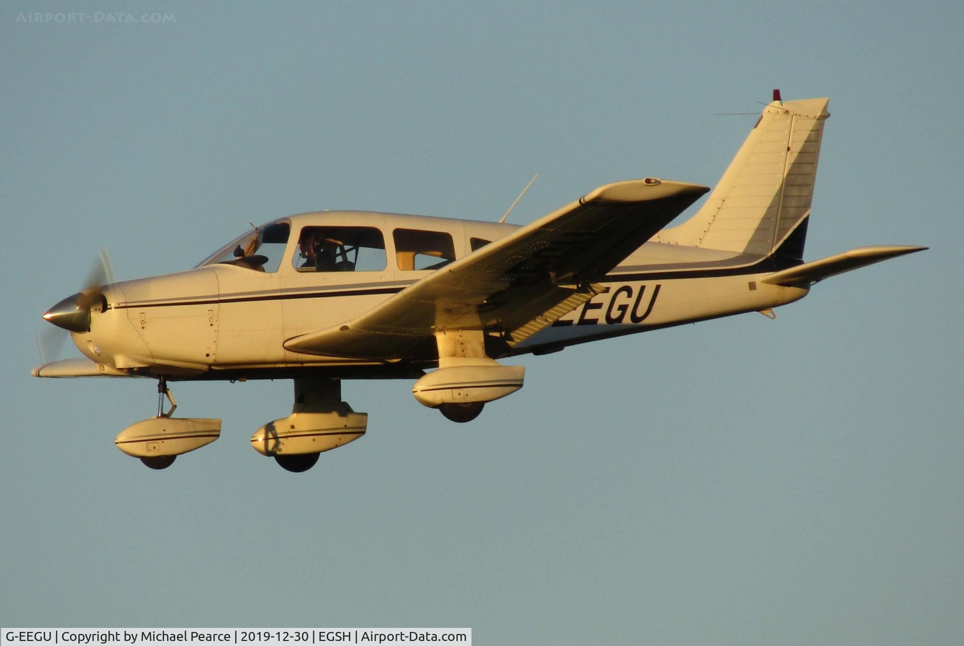 G-EEGU, 1979 Piper PA-28-161 Cherokee Warrior II C/N 28-7916457, On final for RWY 27, carrying out missed approach training.