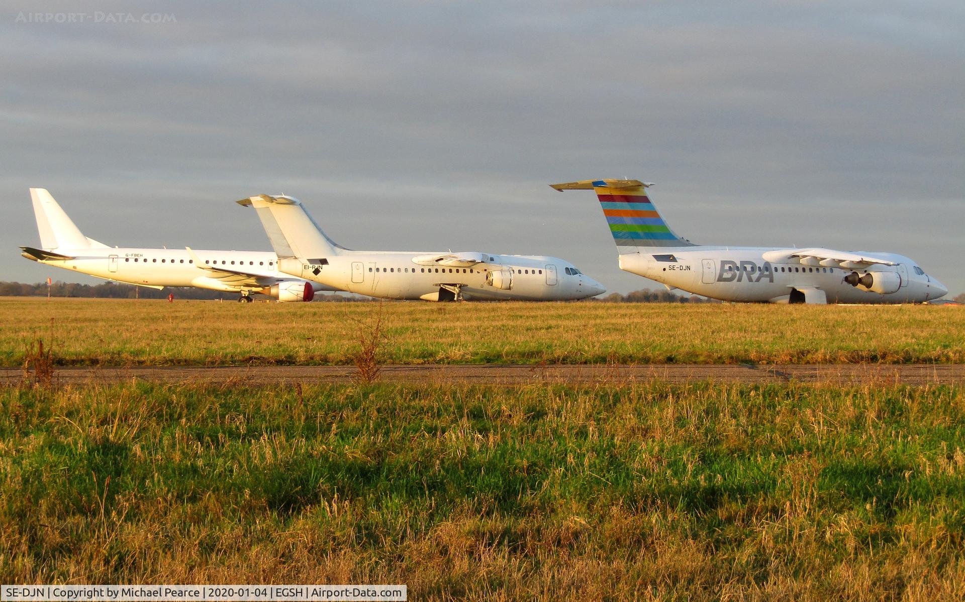 SE-DJN, 1993 British Aerospace Avro 146-RJ85 C/N E.2231, Stored on the North Side alongside G-FBEH and EI-RJN.