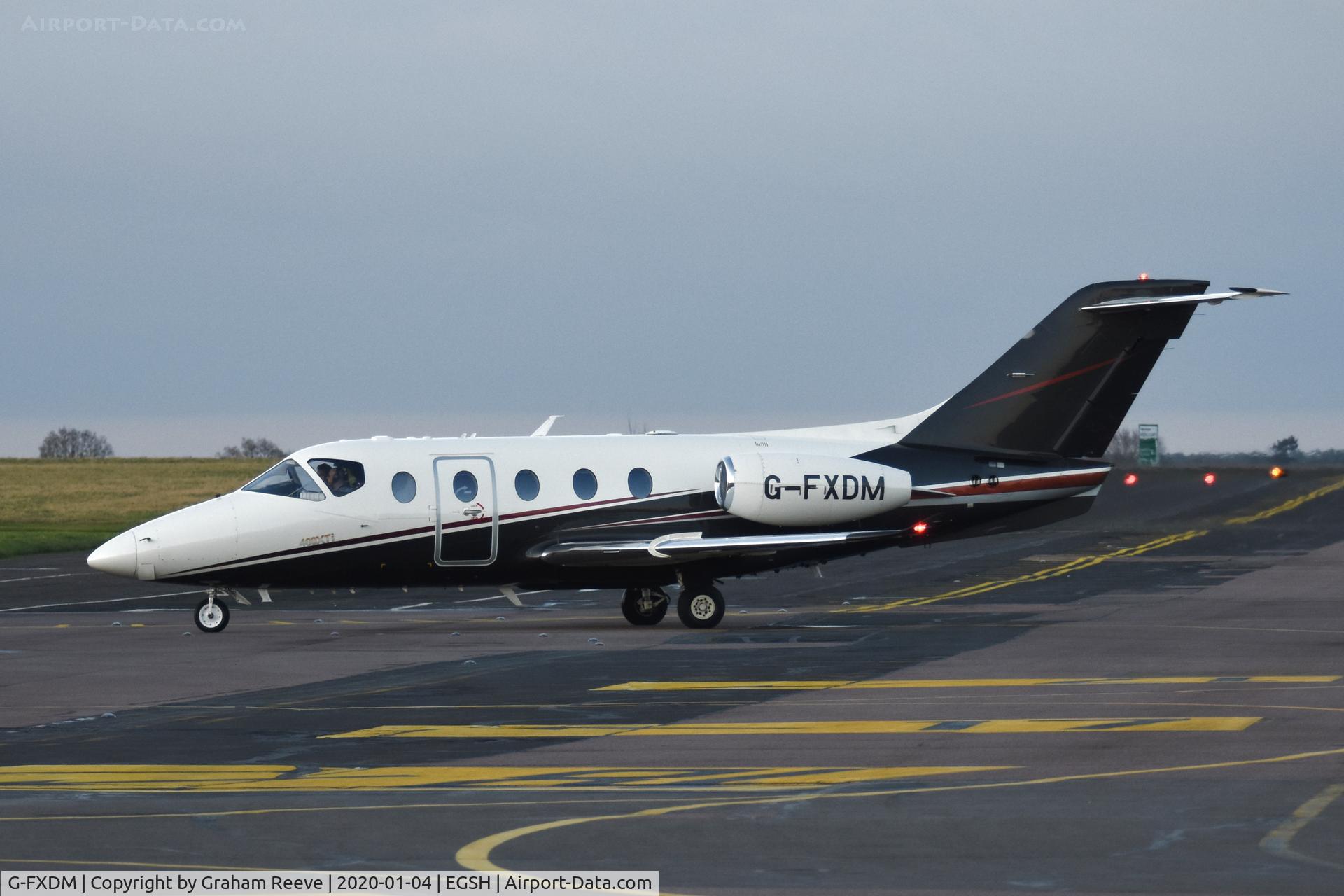 G-FXDM, 2004 Raytheon Beechjet 400A C/N RK-377, Just landed at Norwich.