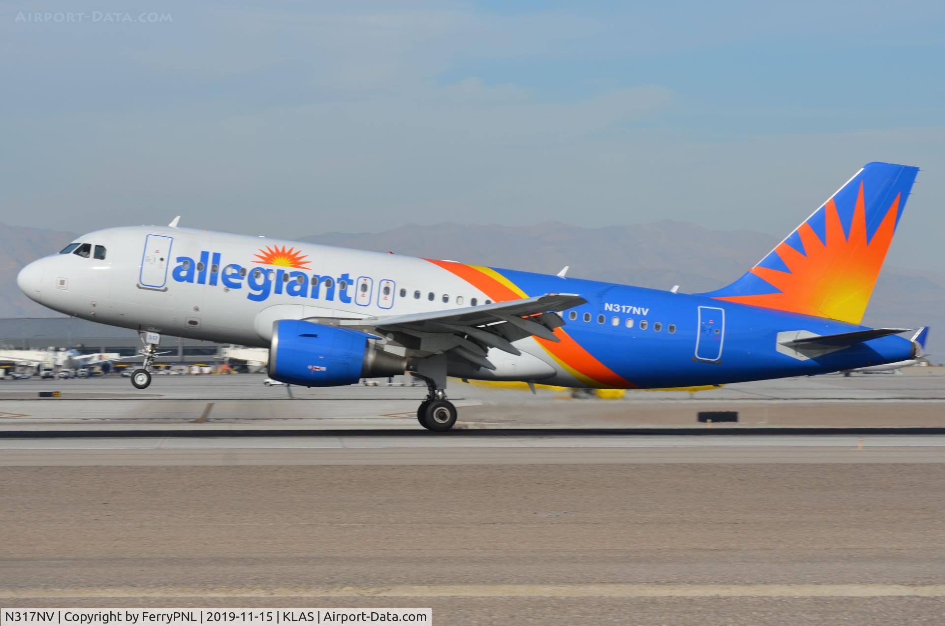 N317NV, 2005 Airbus A319-111 C/N 2477, Allegiant A319 landing in LAS