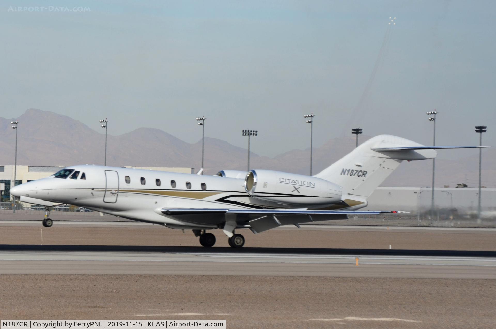 N187CR, 2000 Cessna 750 Citation X Citation X C/N 750-0119, Pakawalup Ce750 landing during an airshow at Nellis in the background.