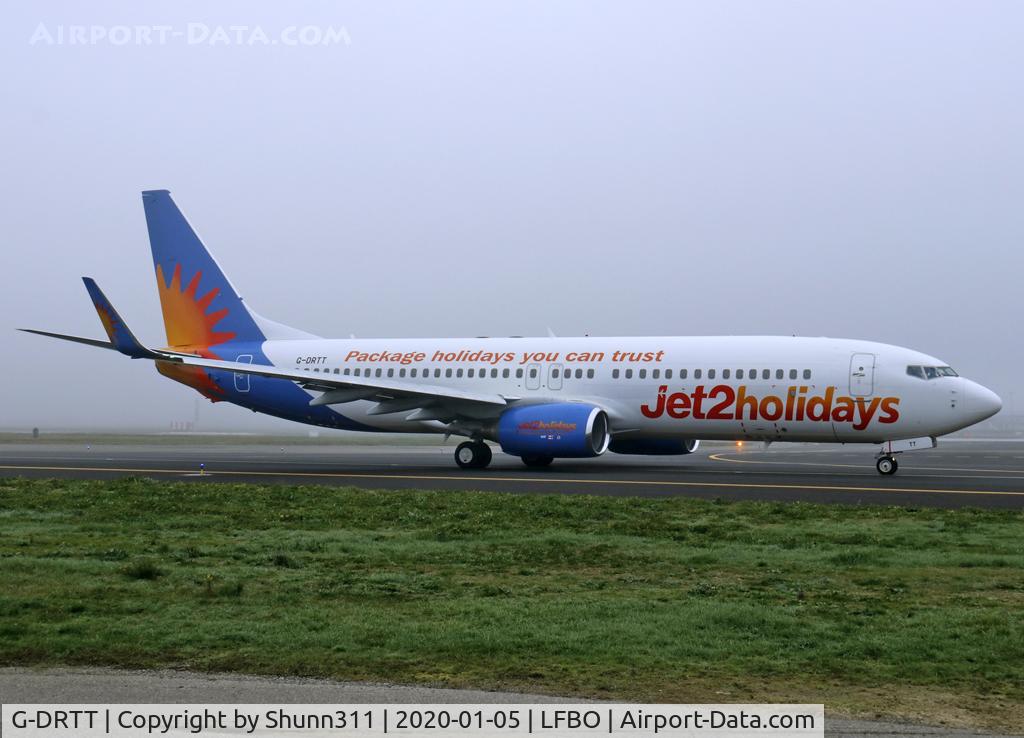 G-DRTT, 2007 Boeing 737-8Q8 C/N 30722, Taxiing holding point rwy 14R under fog...