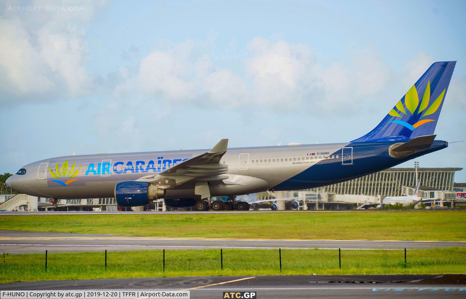 F-HUNO, 2002 Airbus A330-223 C/N 493, Airbus 330-223  operated by Air Caraibes at Guadeloupe Pôle Carraïbes airport (PTP) arriving from Paris (ORY). The aircraft was previously operated by Aigle Azur with tail number F-HTAC.
