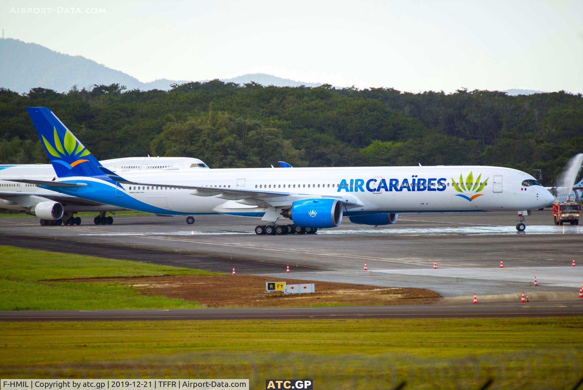 F-HMIL, 2016 Airbus A350-1041 C/N 0065, Although it is in fact second flight of F-HMIL to Guadeloupe the aircraft is on on point to receive its water salute for its first daylight arrival at PTP.