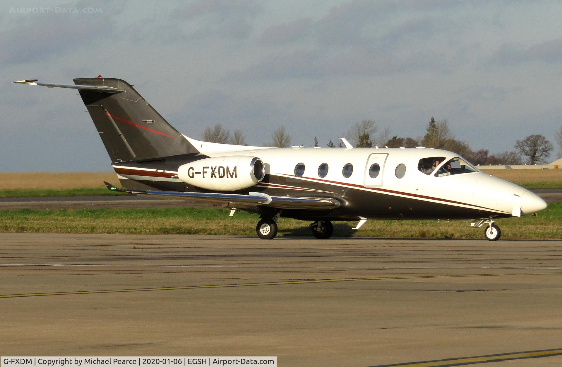G-FXDM, 2004 Raytheon Beechjet 400A C/N RK-377, Departing to Birmingham (BHX).