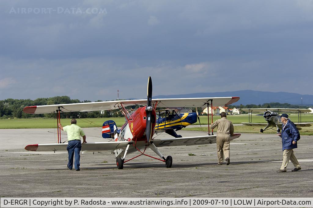 D-ERGR, 1953 CASA 1-131E Jungmann C/N 2010, Two Jungmann and one Jungmeister at Aerodrome Wels