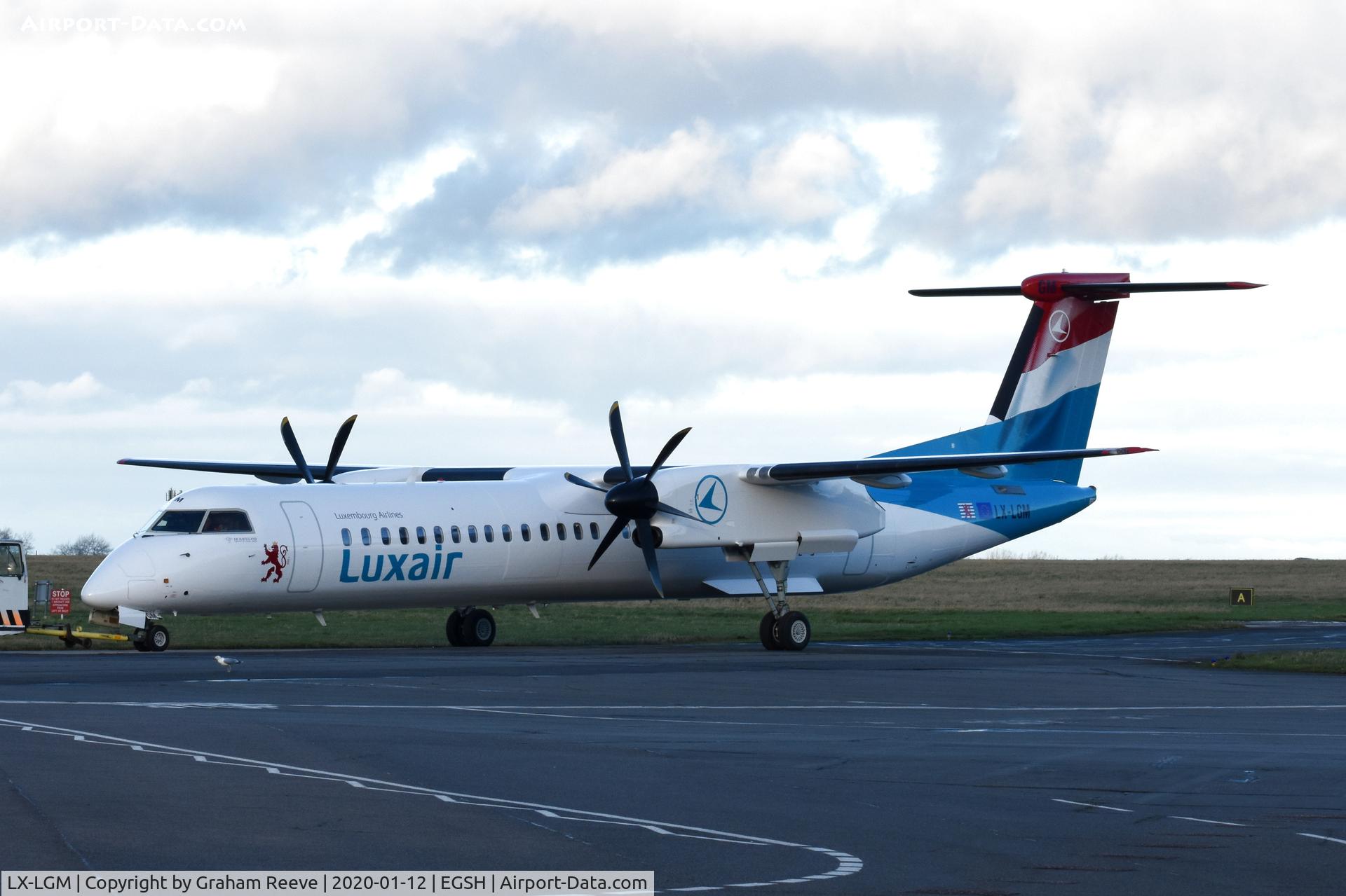 LX-LGM, 2012 De Havilland Canada DHC-8-402Q Dash 8 C/N 4425, Under tow at Norwich.