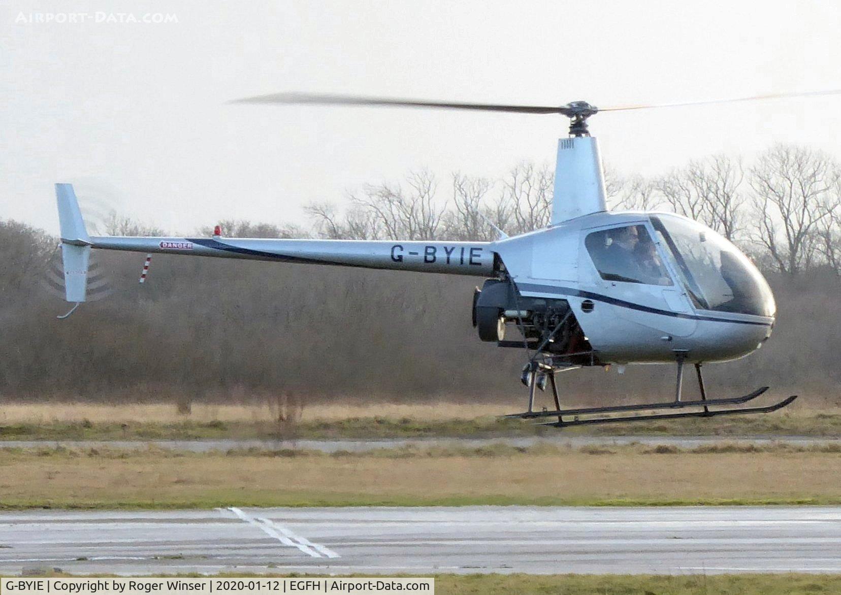 G-BYIE, 1999 Robinson R22 Beta C/N 2933, Resident R-22 Beta helicopter operated by HeliAir Wales.