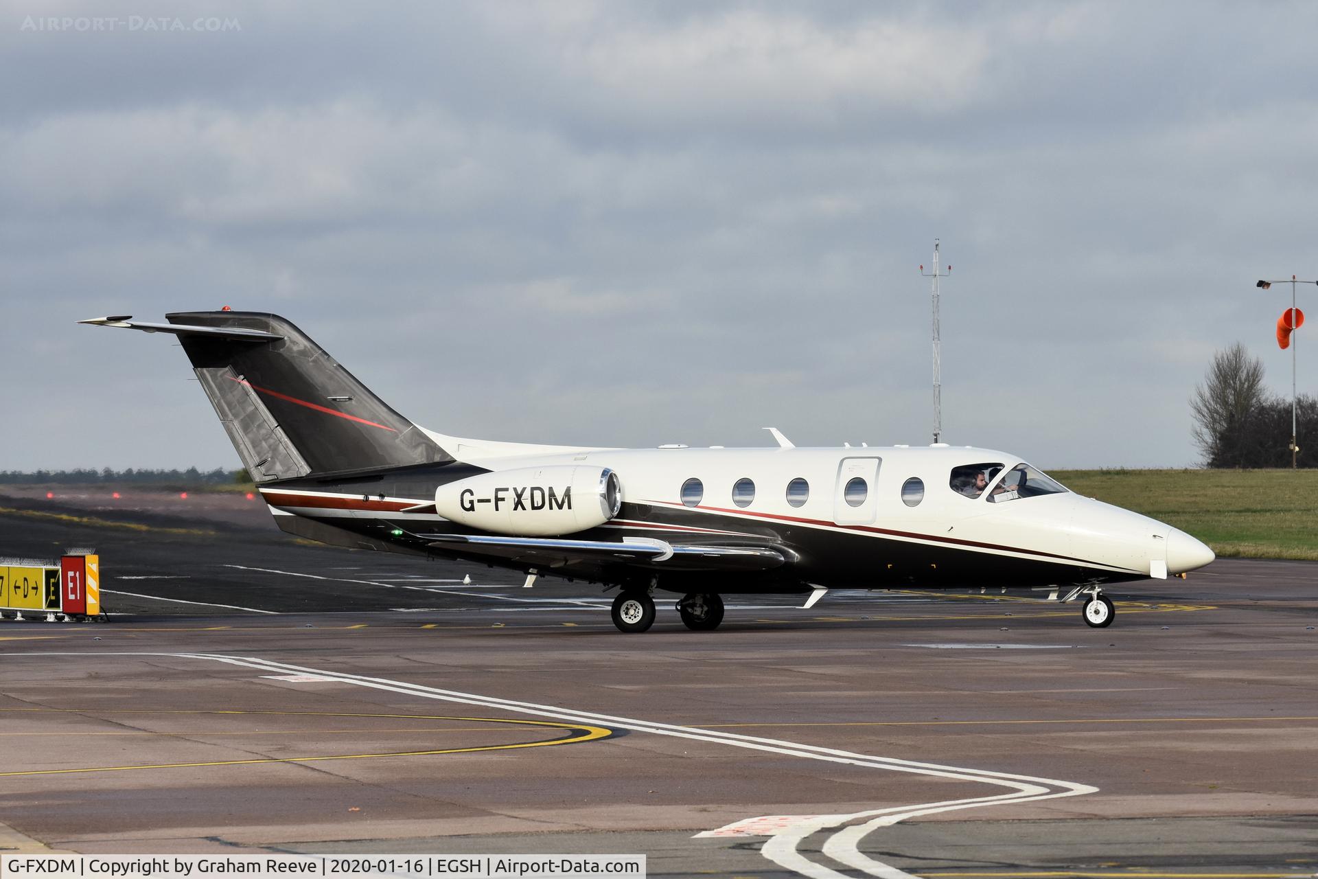 G-FXDM, 2004 Raytheon Beechjet 400A C/N RK-377, Departing from Norwich.