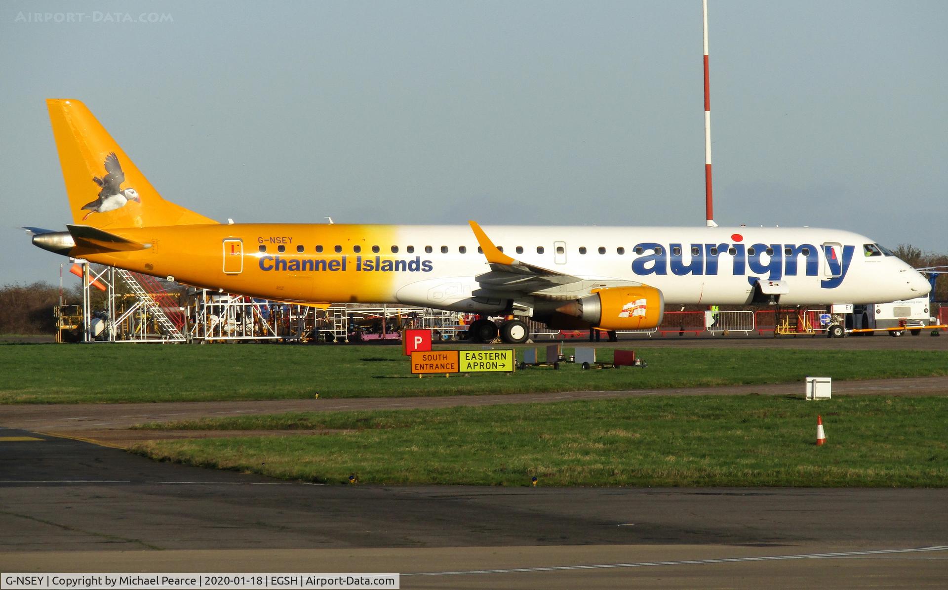 G-NSEY, 2014 Embraer 195STD (ERJ-190-200STD) C/N 19000671, Parked on the Eastern Apron following some maintenance work. First time visit by Aurigny for maintenance.