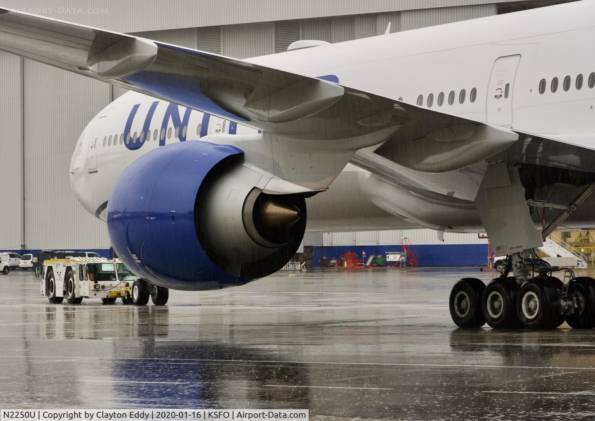 N2250U, 2019 Boeing 777-300/ER C/N 66590, Rainy day. SFO 2020.