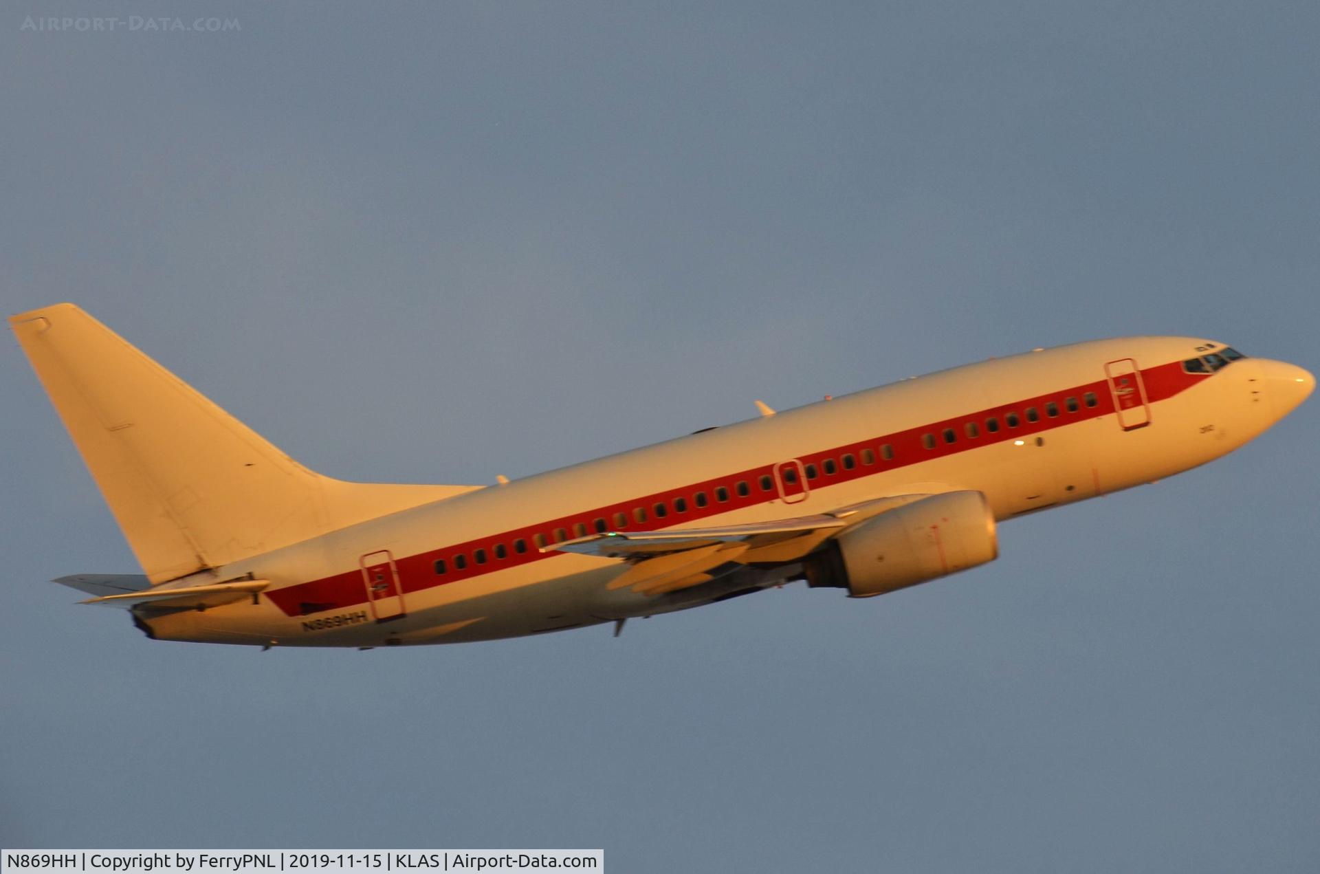 N869HH, 2001 Boeing 737-66N C/N 28650, EG&G (Janet) B736 departing at sunset
