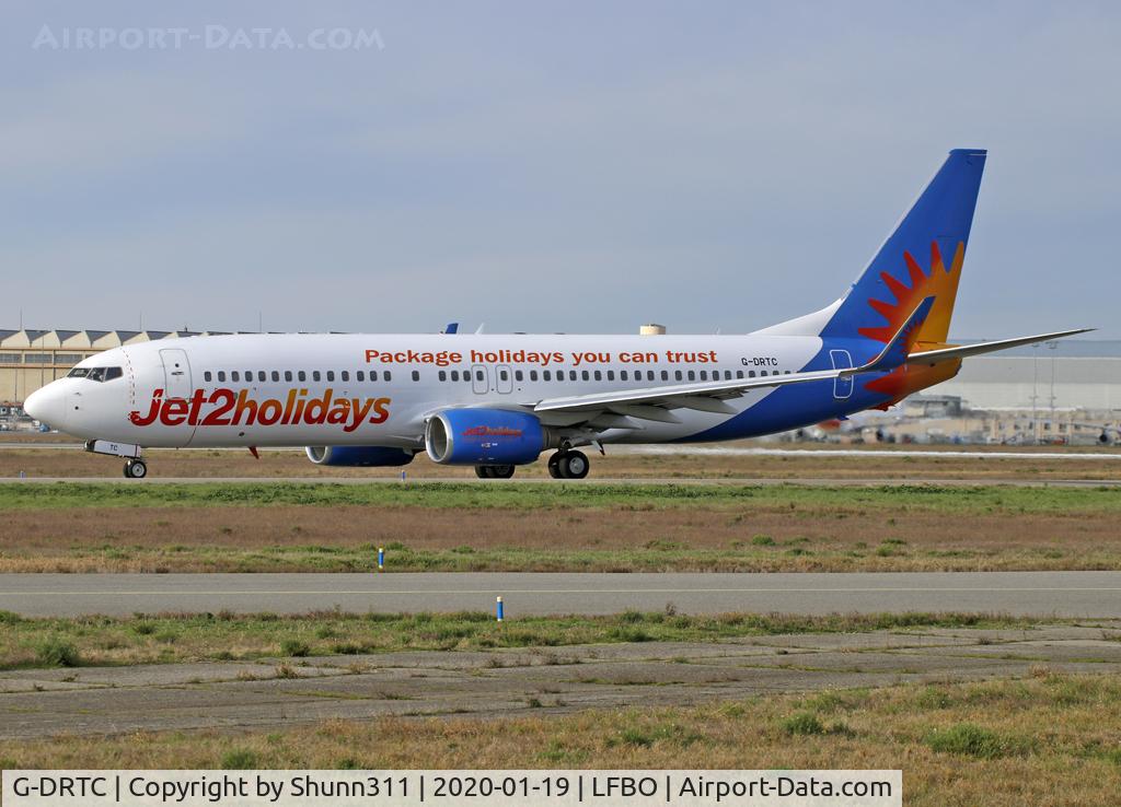 G-DRTC, 2006 Boeing 737-808 C/N 34702, Taxiing holding point rwy 32R for departure...