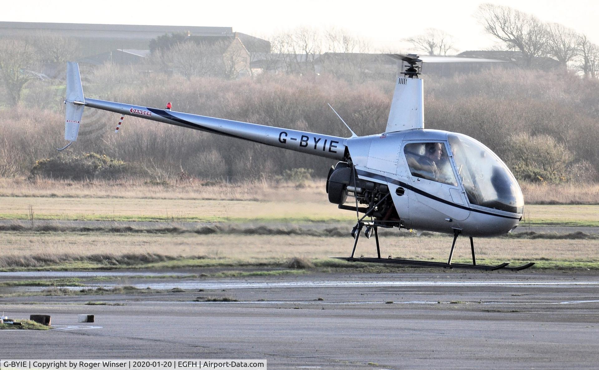G-BYIE, 1999 Robinson R22 Beta C/N 2933, Resident R-22 Beta operated by HeliAir Wales.